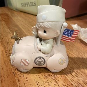 Precious Moments, 1994 You Will Always Be Our Hero figurine.